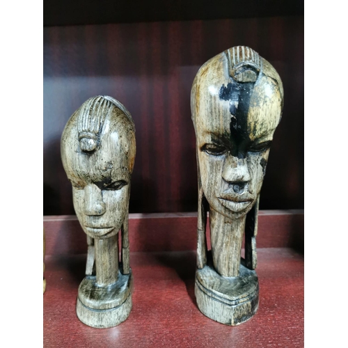 23 - A quantity of good african carved figures inc a set of see no evil hear no evil. Tallest figure is 2... 