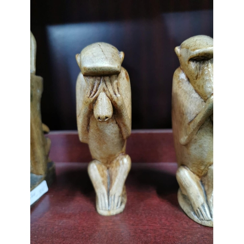 23 - A quantity of good african carved figures inc a set of see no evil hear no evil. Tallest figure is 2... 