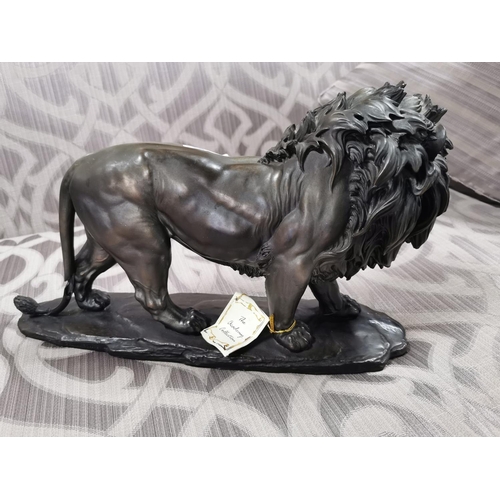 25 - one resin bronze colour lion and one crystal glass lion on plinths. Height of largest item is 23cm x... 