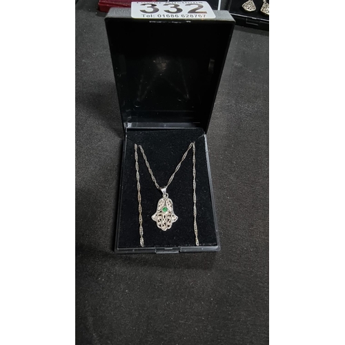 332 - 925 silver hand pendant with green stone on an 18