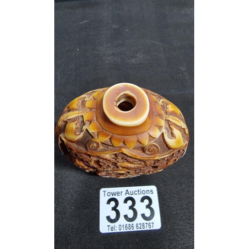 333 - Antique asian intricately carved bone snuff bottle, in good condition missing its stopper height 8.5... 