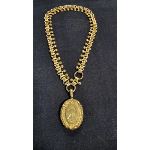 340 - Vintage gold plated large locket on an unusual plated chain in good order. locket high 4.5cm x 3.5cm... 