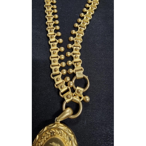 340 - Vintage gold plated large locket on an unusual plated chain in good order. locket high 4.5cm x 3.5cm... 