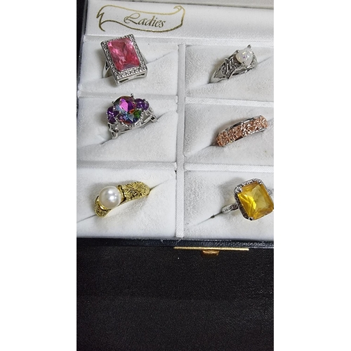 344 - Cased set of 12 ornate silver plated dress rings various large coloured stones various sizes L to W ... 