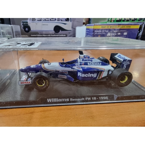 124 - 2X Formula 1 moddel Diecast cars in presentation boxes