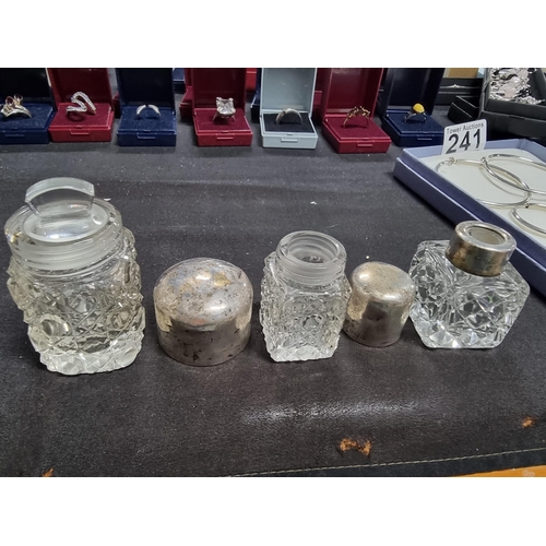 189 - Quantity of various bottles some with hallmarked silvered tops inc a Chinese brush bottle, a sliver ... 