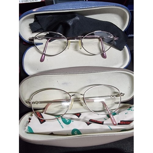 198 - Collection of 8 pairs of spectacles all in cases inc a pair of octagonal framed glasses