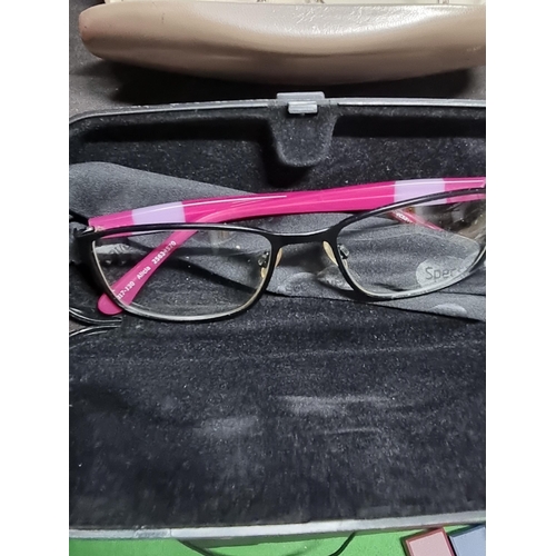 198 - Collection of 8 pairs of spectacles all in cases inc a pair of octagonal framed glasses