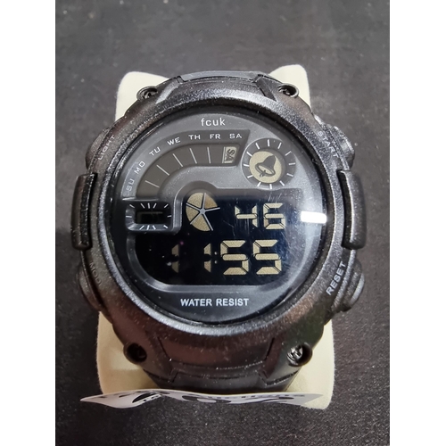 202 - Gents digital watch by FCUK day date alarm and light in full working order in excellent hardly used ... 