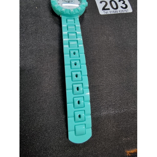 203 - Ladies collectable Flik Flak swiss made watch in a turquoise colour and a jewelled dial, made in may... 