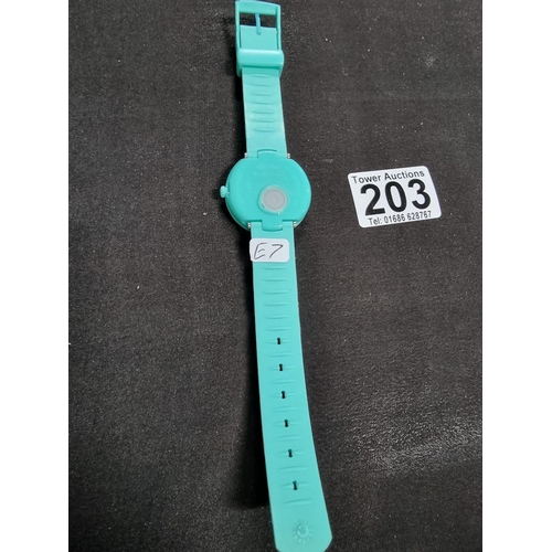 203 - Ladies collectable Flik Flak swiss made watch in a turquoise colour and a jewelled dial, made in may... 