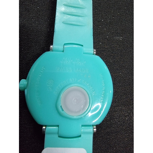 203 - Ladies collectable Flik Flak swiss made watch in a turquoise colour and a jewelled dial, made in may... 