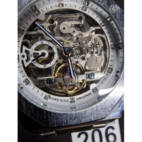 206 - Gents silver tone octagcanol bezel Skelton dial automatic watch appears to be in working condition a... 