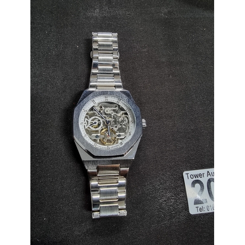 206 - Gents silver tone octagcanol bezel Skelton dial automatic watch appears to be in working condition a... 