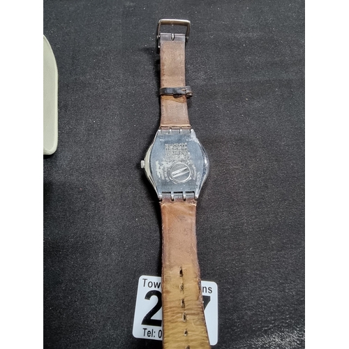 207 - Vintage swatch irony unisex chrome watch on a good leather strap in working condition requires a new... 