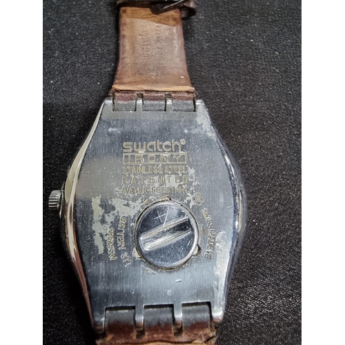 207 - Vintage swatch irony unisex chrome watch on a good leather strap in working condition requires a new... 