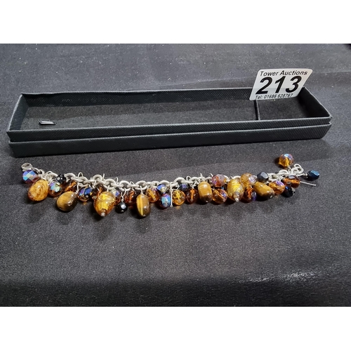 213 - 925 silver bracelet with a large quantity of bead drops inc art glass tigers eye onyx and crystal gl... 