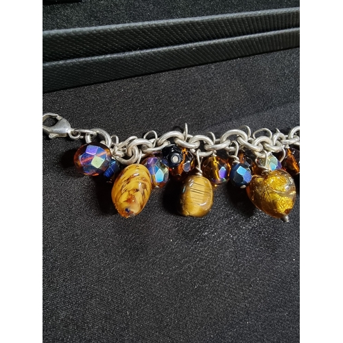 213 - 925 silver bracelet with a large quantity of bead drops inc art glass tigers eye onyx and crystal gl... 