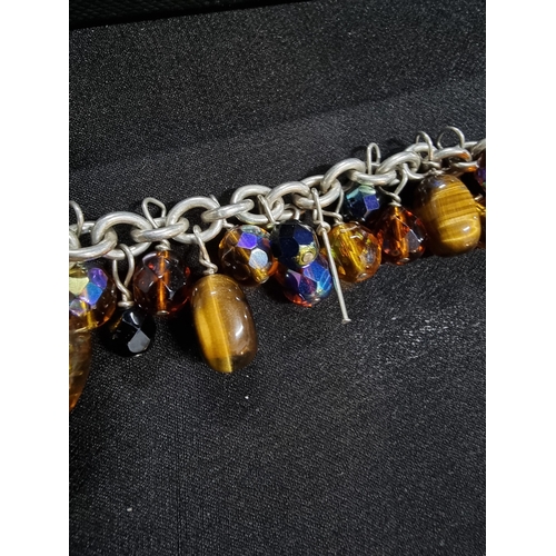 213 - 925 silver bracelet with a large quantity of bead drops inc art glass tigers eye onyx and crystal gl... 