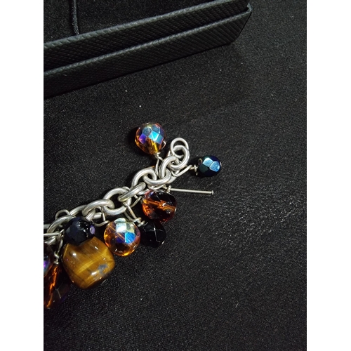 213 - 925 silver bracelet with a large quantity of bead drops inc art glass tigers eye onyx and crystal gl... 