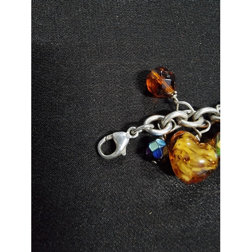 213 - 925 silver bracelet with a large quantity of bead drops inc art glass tigers eye onyx and crystal gl... 