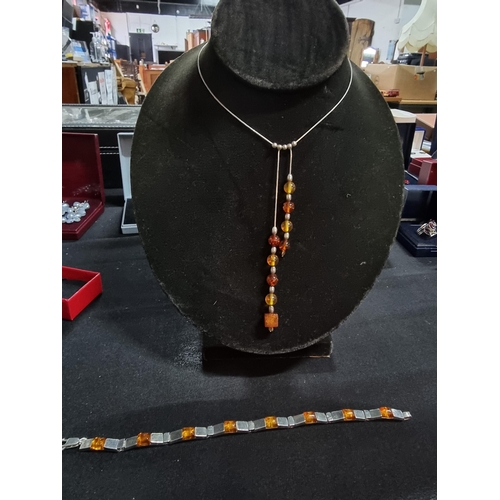 214 - 925 silver necklace with 2 strand amber drops along with a 925 silver bracelet with amber stones nec... 