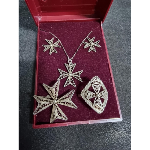 215 - Suite of matching Malta silver jewellery with the Maltese cross design pendant and chain earrings br... 