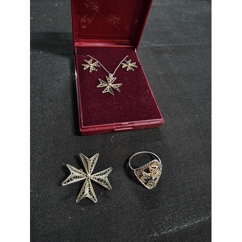 215 - Suite of matching Malta silver jewellery with the Maltese cross design pendant and chain earrings br... 