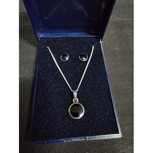 216 - 925 silver matching set pendant chain and earrings with onyx stones inset on an 18in silver chain