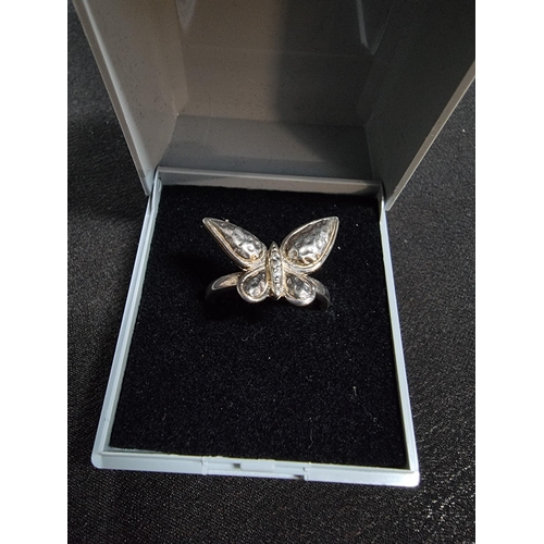 219 - 925 silver butterfly ring inset with small cz stones marked 925