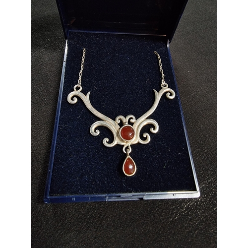 220 - 925 sterling silver pendant inset with two garnet stones on a 16in 925 silver chain gem stones teste... 