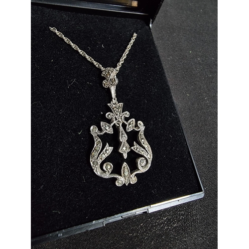 221 - pretty sterling silver marcasite pendant on a good very long 24in silver chain