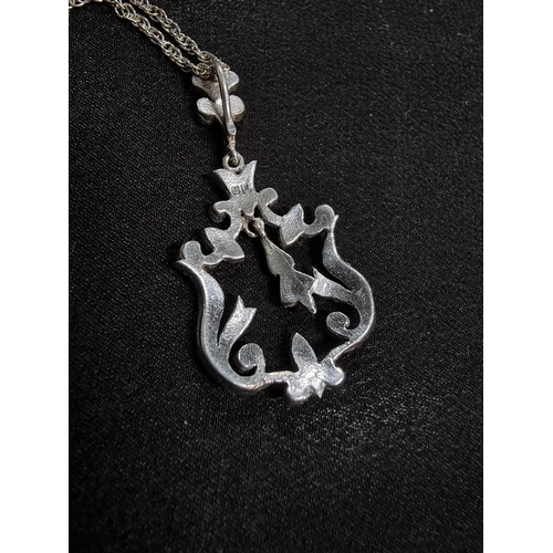 221 - pretty sterling silver marcasite pendant on a good very long 24in silver chain