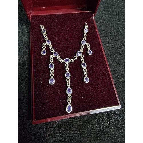 222 - Vintage 925 silver drop necklace inset with a quantity iolite gemstones total length of chain 16in  ... 