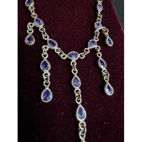 222 - Vintage 925 silver drop necklace inset with a quantity iolite gemstones total length of chain 16in  ... 