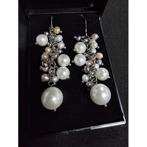 224 - Pair of striking 925 silver pearl drop earrings with a mixture of simulated and genuine pears length... 