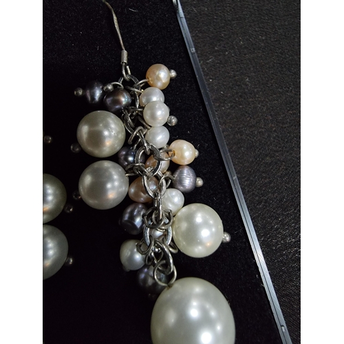 224 - Pair of striking 925 silver pearl drop earrings with a mixture of simulated and genuine pears length... 