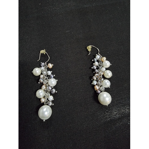 224 - Pair of striking 925 silver pearl drop earrings with a mixture of simulated and genuine pears length... 