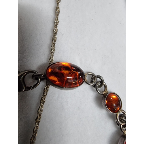 232 - Good suite of matching 925 silver Baltic amber jewellery with inclusions inc a bracelet pendant chai... 