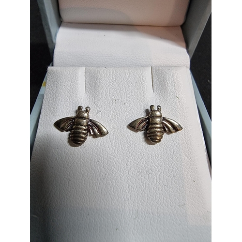 234 - Pair of 925 sterling silver bee formed stud earrings by Dew- Kit Heath in their original box