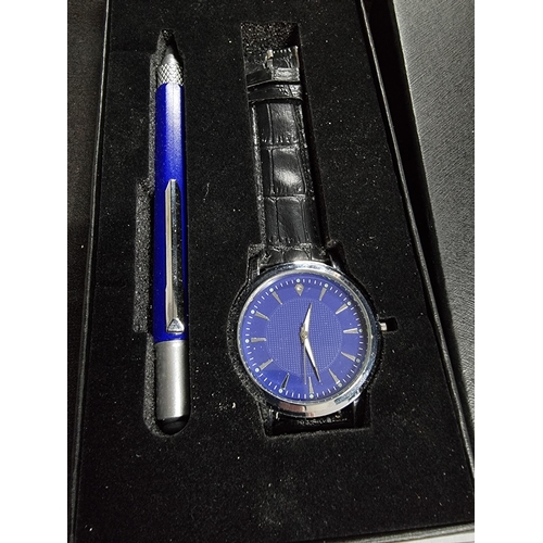 238 - Modern as new boxed and unused gents birthday gift set with apen and watch with a gem to the side