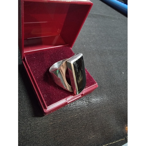 250 - Chunky 925 silver ring inset with a large rectangular onyx stone fully hallmarked inside the band ma... 