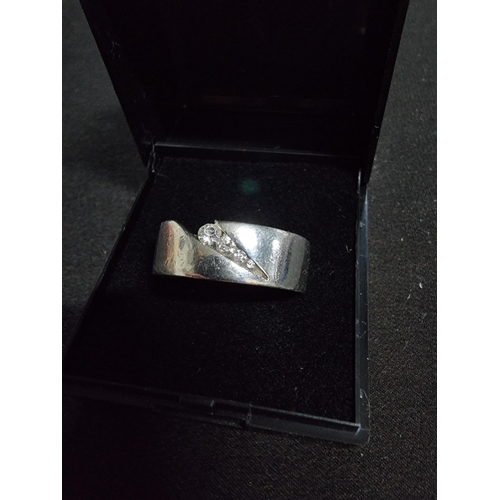 253 - very chunky 925 silver ring inset with 4cz stones full hallmarks inside the band size 'T' total weig... 