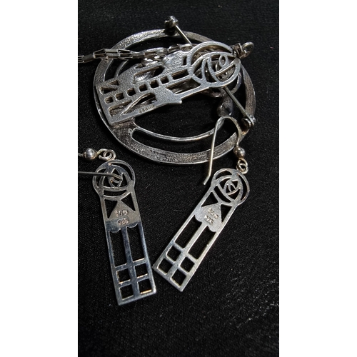 271 - 925 silver pendant on an 18inc chain along with a matching brooch and earrings with a Charles Rene m... 