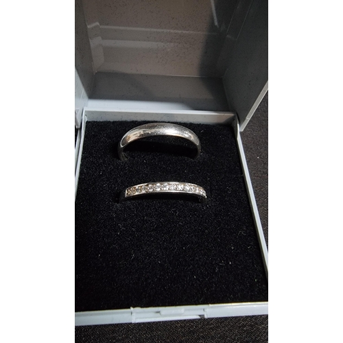 276 - 2 x 925 silver rings one is a plain band in good clean condition marked 925 size Q the other has a q... 