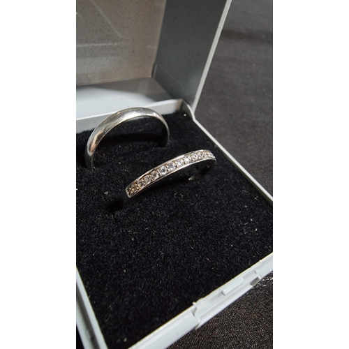 276 - 2 x 925 silver rings one is a plain band in good clean condition marked 925 size Q the other has a q... 