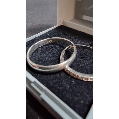 276 - 2 x 925 silver rings one is a plain band in good clean condition marked 925 size Q the other has a q... 