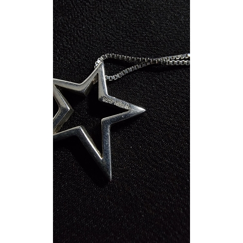 289 - 925 silver star pendant inset with 3 genuine diamonds on a 18in 925 silver chain in good condition b... 