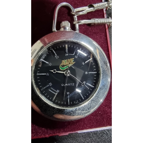 293 - Vintage Nike quartz chrome pocket watch and chrome chain with a black dial that changes to various c... 