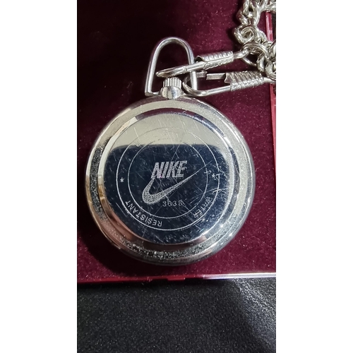 293 - Vintage Nike quartz chrome pocket watch and chrome chain with a black dial that changes to various c... 